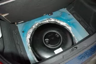 A toroidal LPG tank mounted in the spare wheel well
