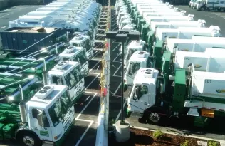 A fleet of CNG-powered refuse trucks