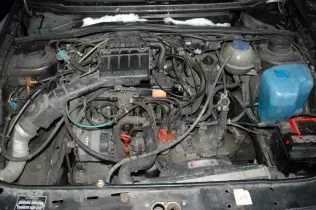 The engine bay of a car converted to run on LPG