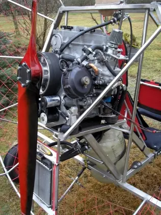 The engine and propeller of an LPG-powered paraglider