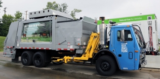 A CNG-powered garbage truck at a refueling station in Lexington, Kentucky
