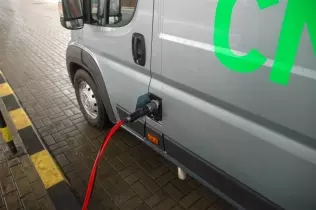 Fiat Ducato Natural Power being refueled at a CNG station