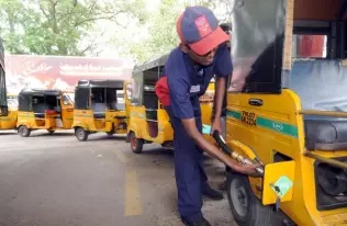 LPG-powered auto rickshaws lining up to refuel at a station in Bangladesh