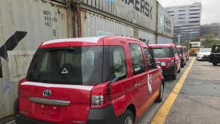 Toyota JPN Taxi waiting in a Hong Kong port